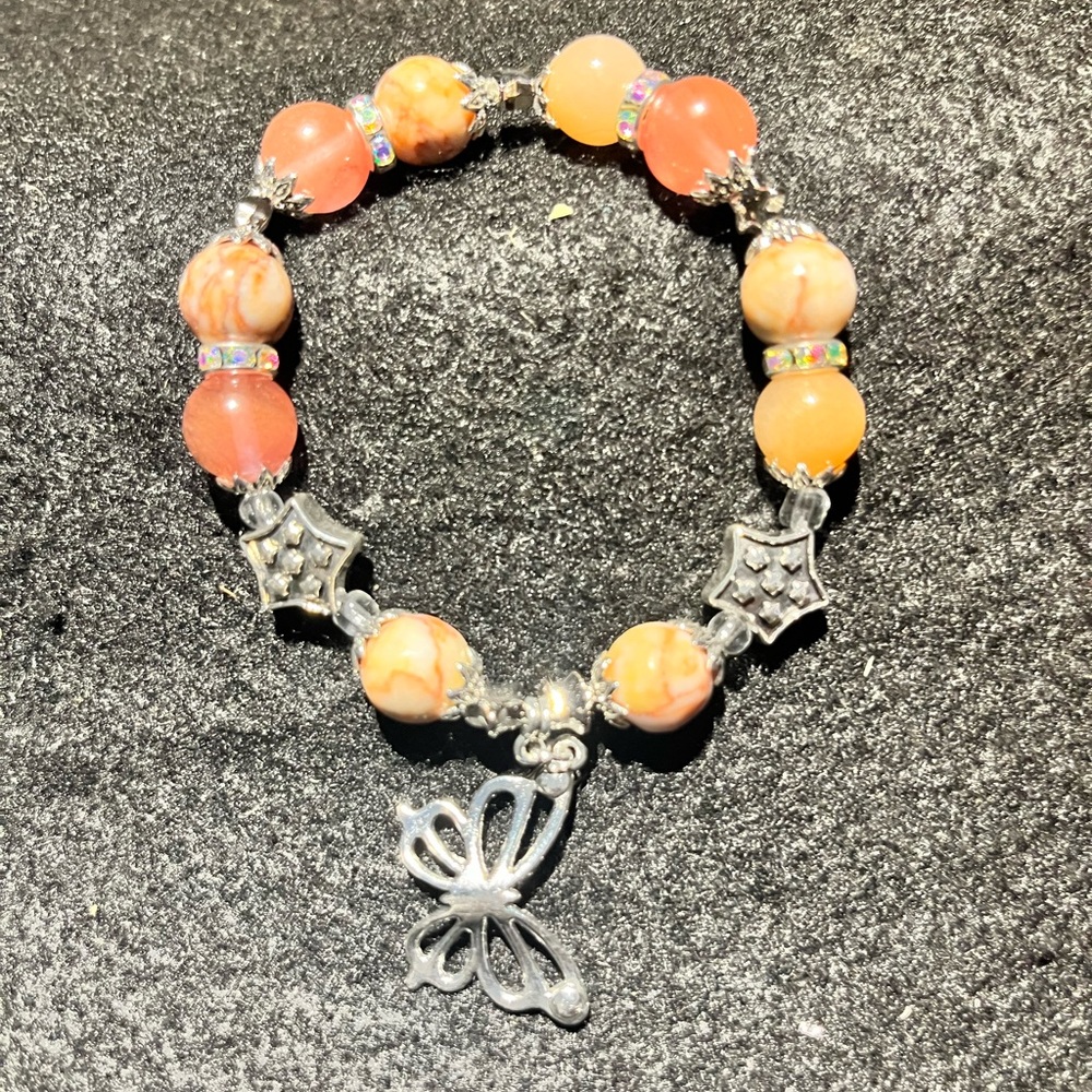 Pink glass and natural stone star and butterfly bracelet